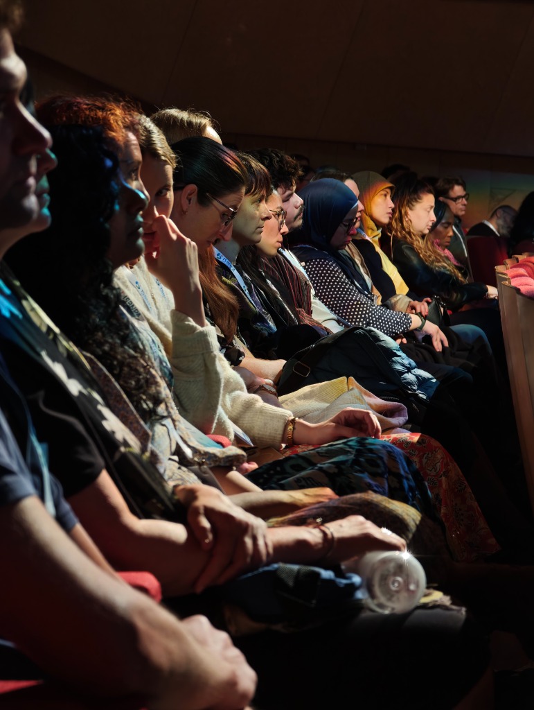 Audience listening to a keynote at an ISBNPA annual meeting